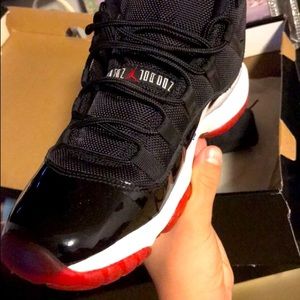 Size 6 youth Retro Bred 11’s